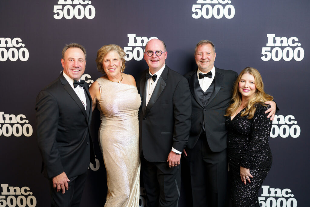Revenue Rocket team posing at the Inc 5000 gala